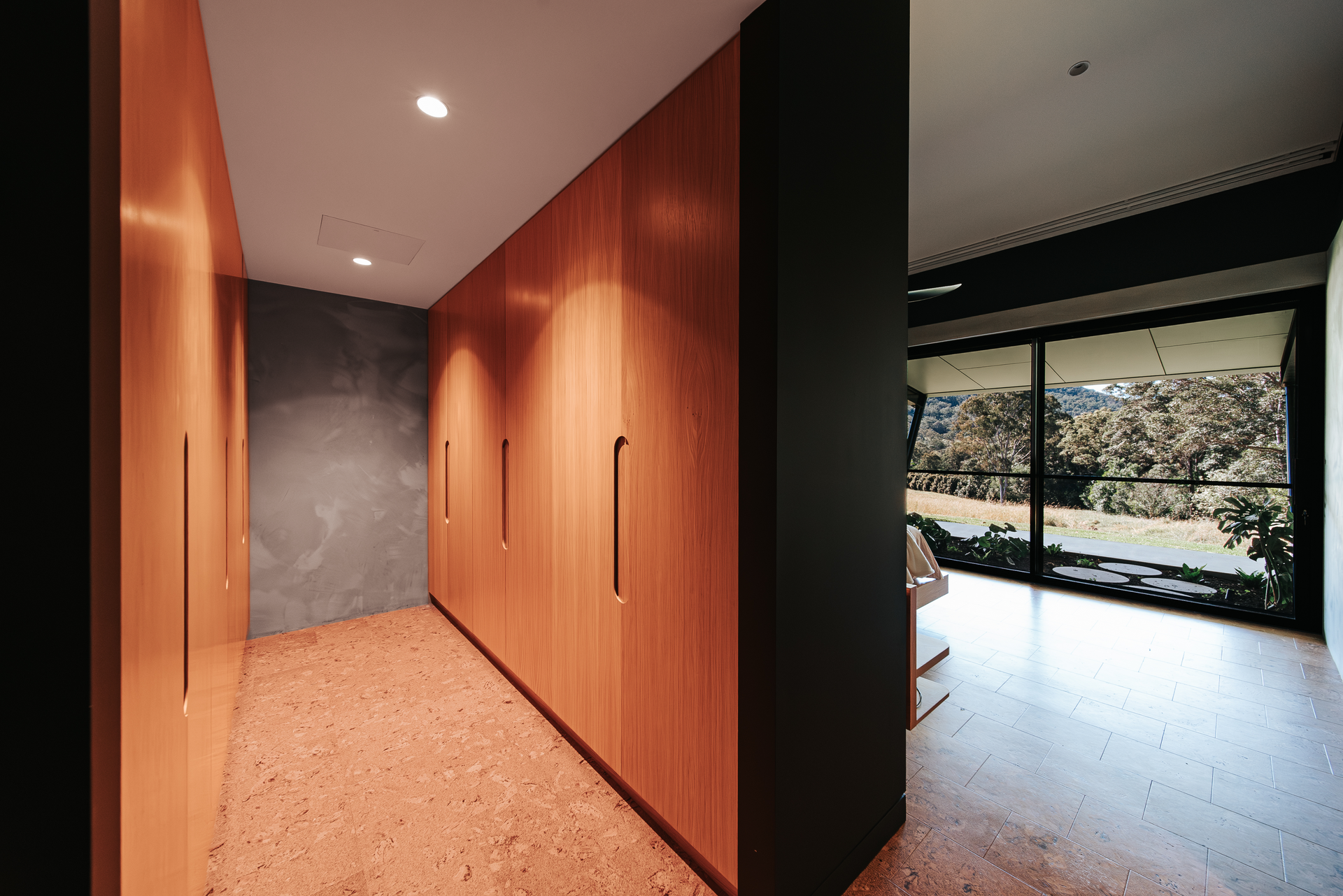 Walk-in Closet With Wooden Doors, Terrazzo Floor, and View of a Tree — ATH Projects in Eerwah Vale, QLD