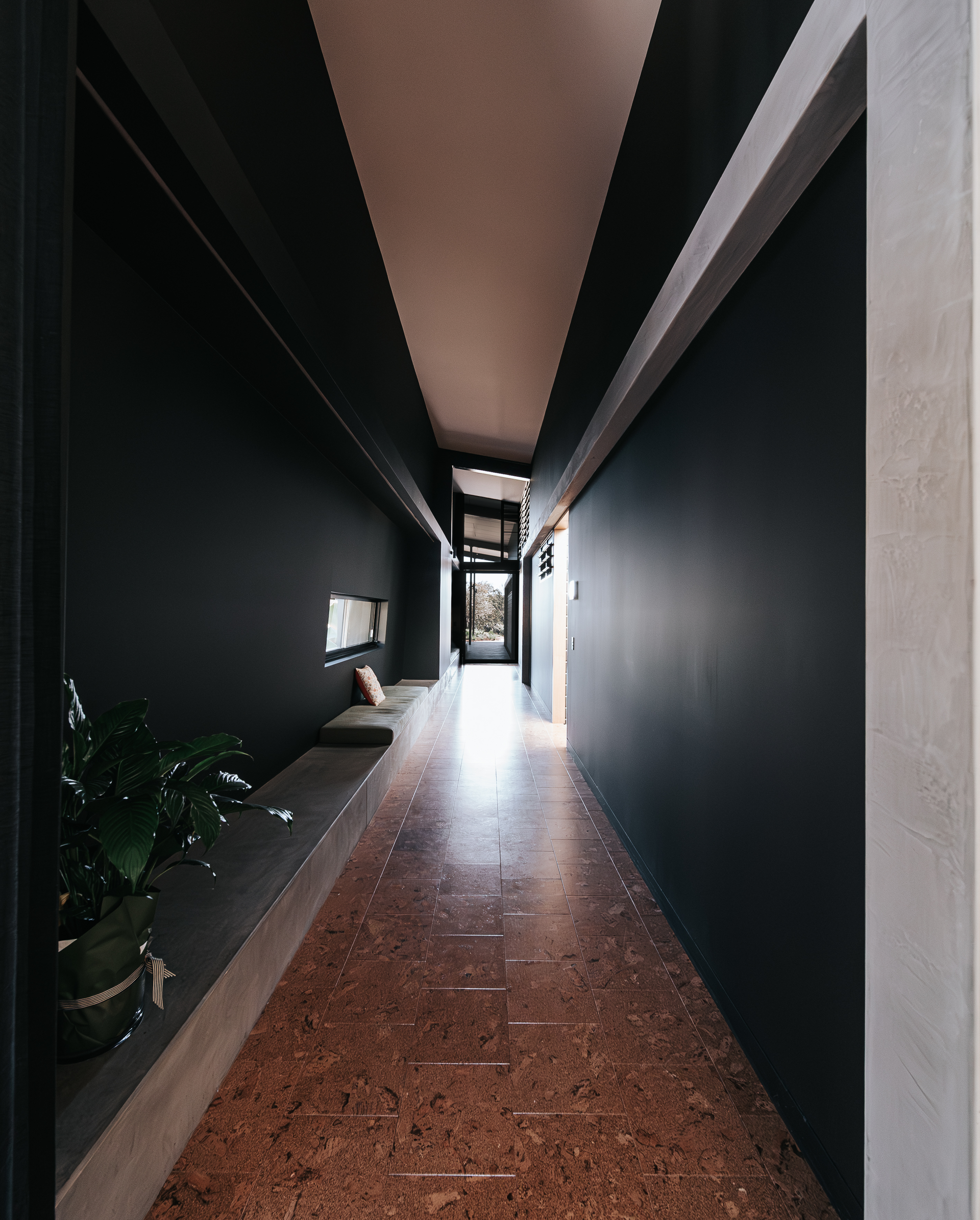 Long, Narrow Hallway With Dark Walls — ATH Projects in Eerwah Vale, QLD