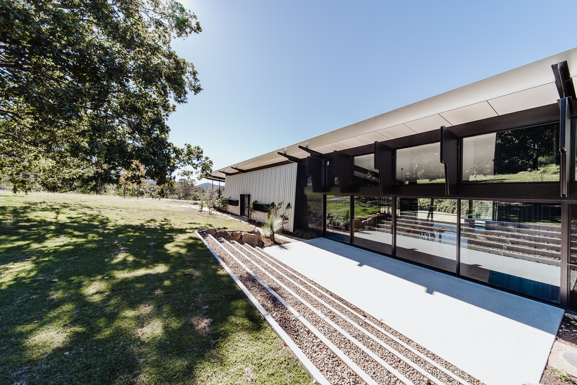 Long, Modern Building With a Glass Wall — ATH Projects in Eerwah Vale, QLD