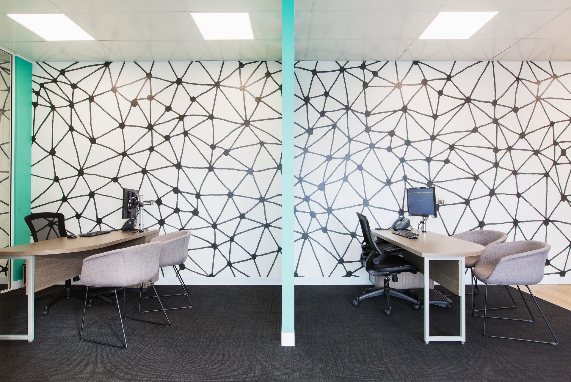 Two Office Workstations With Patterned Wallpaper and Teal Divider — ATH Projects in Kirrawee, NSW