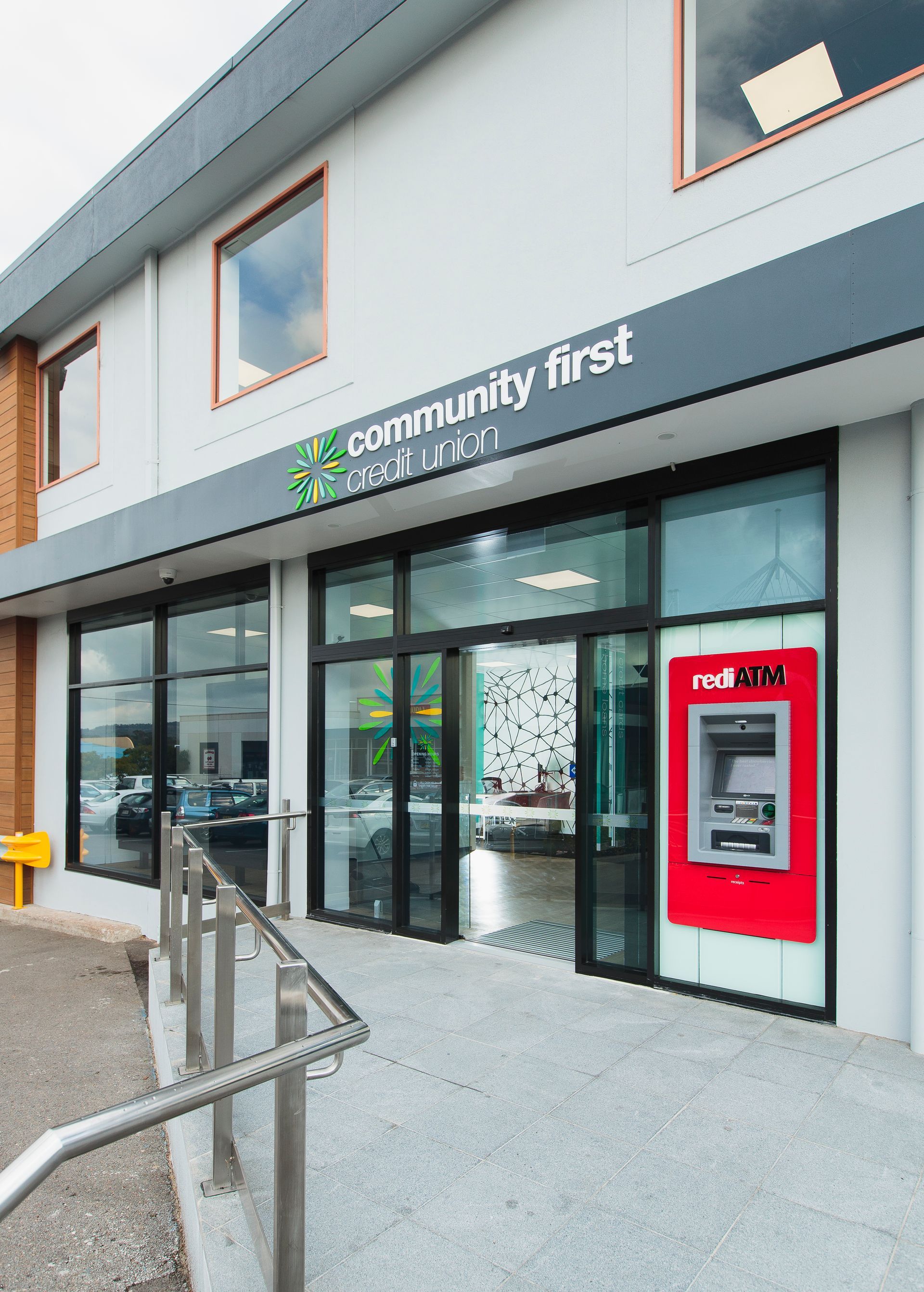 Community First Credit Union Building With Red Atm and Ramp — ATH Projects in Kirrawee, NSW