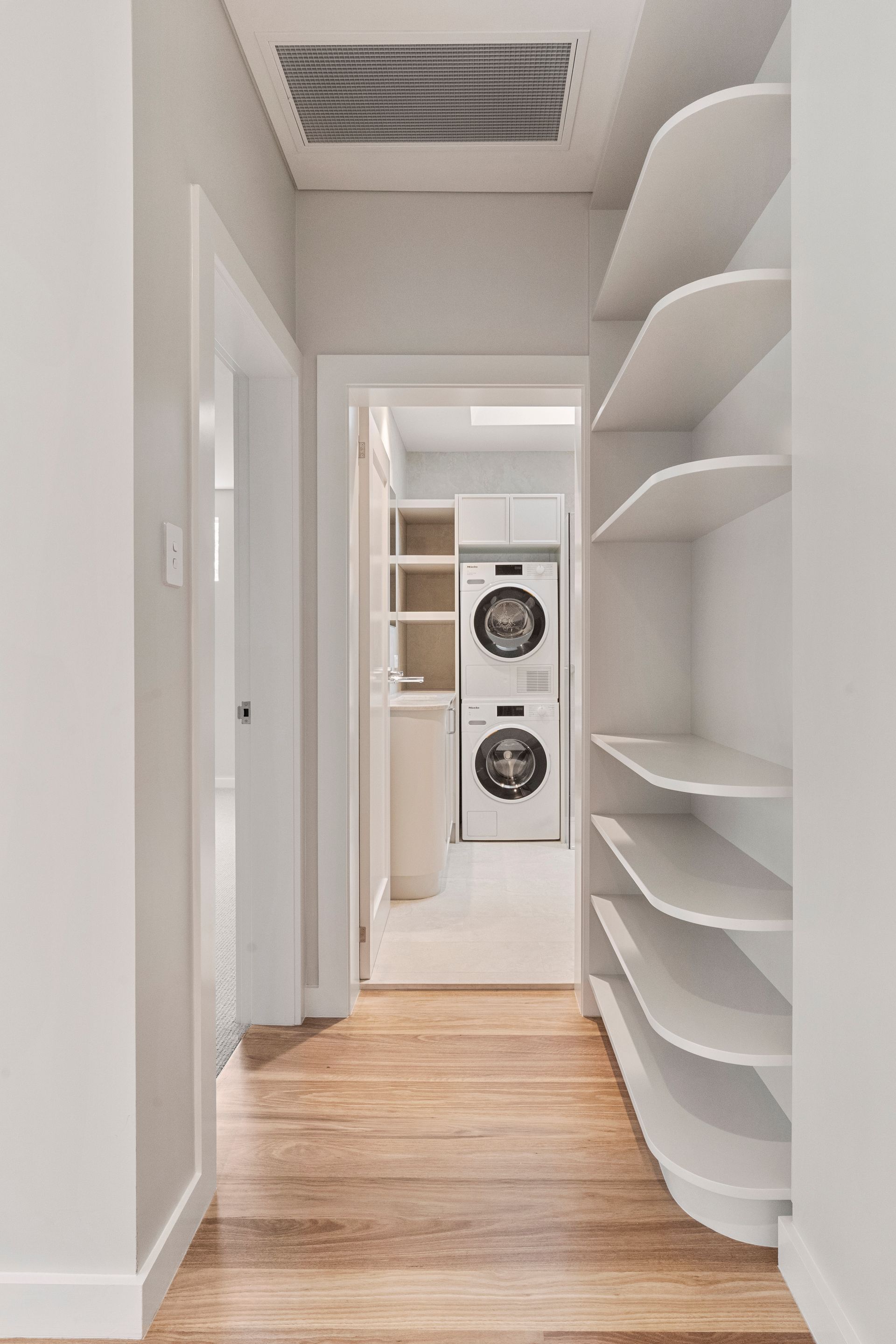 Hallway With Built-in Shelves on One Side — ATH Projects in Mosman, NSW