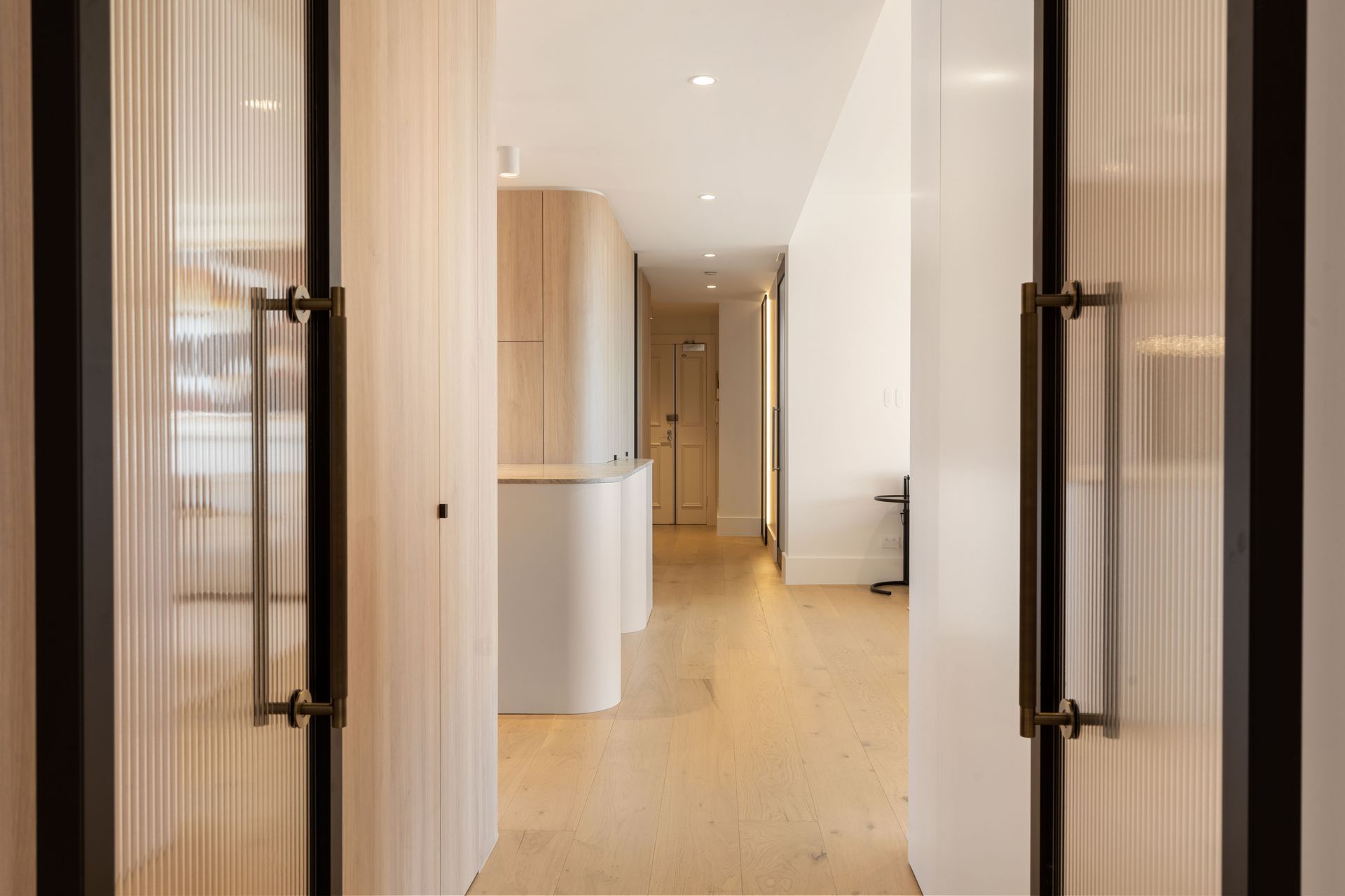 Modern Kitchen with Large Island, Stone Accent Wall and Floor — ATH Projects in Sutherland Shire, NSW