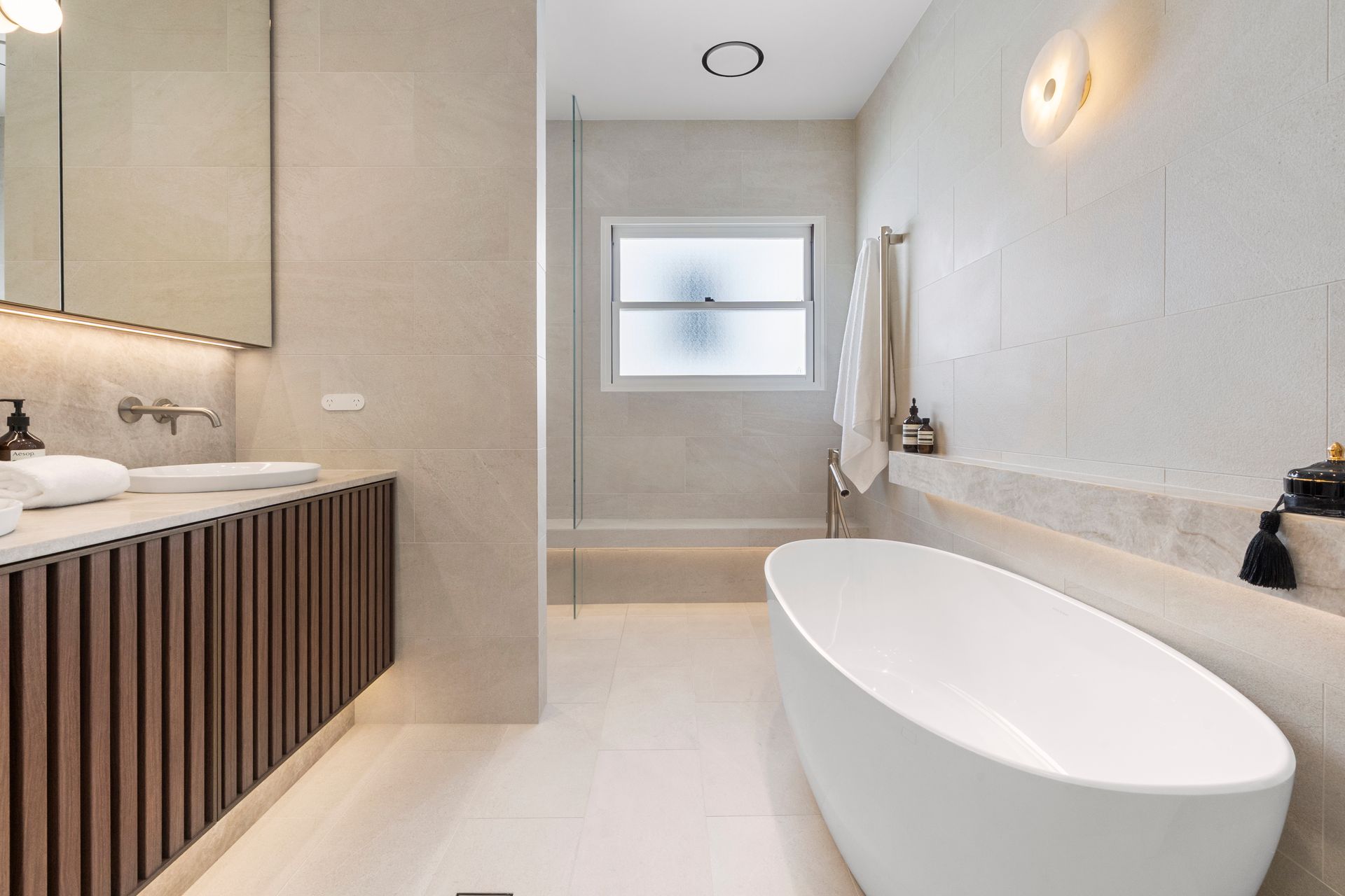 Modern Bathroom With a White Oval Tub — ATH Projects in Concord, NSW