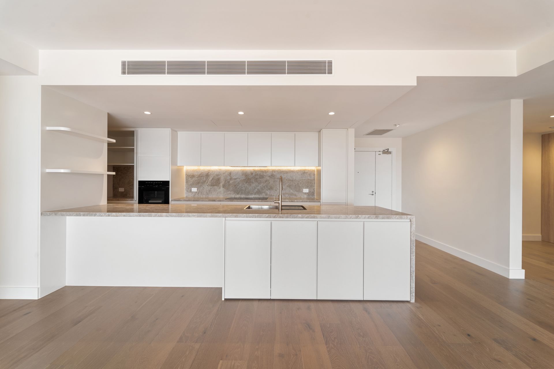 Modern White Kitchen With Island, Marble Backsplash, and Wooden Floors — ATH Projects in Rozelle, NSW