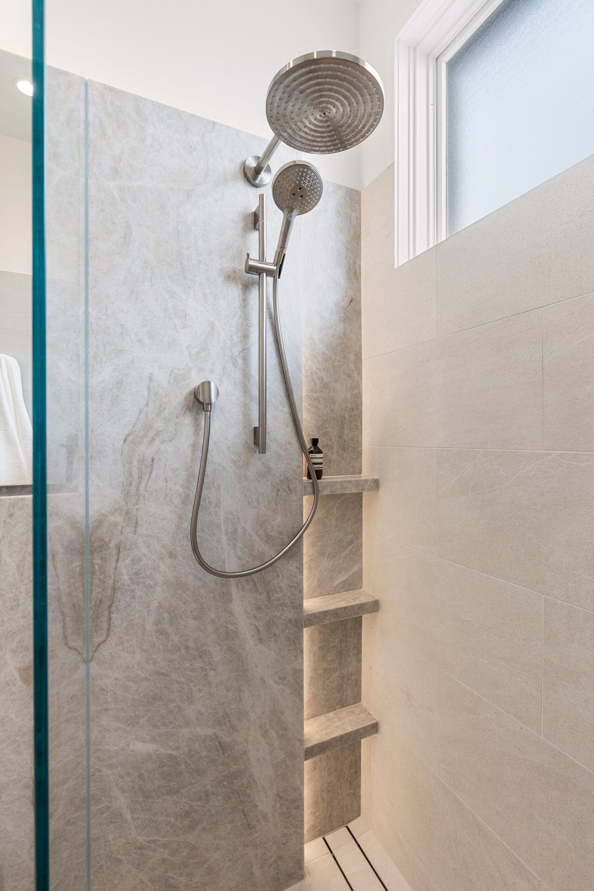 Shower With Gray Tile Walls, Two Showerheads, and Built-in Shelves — ATH Projects in Concord, NSW