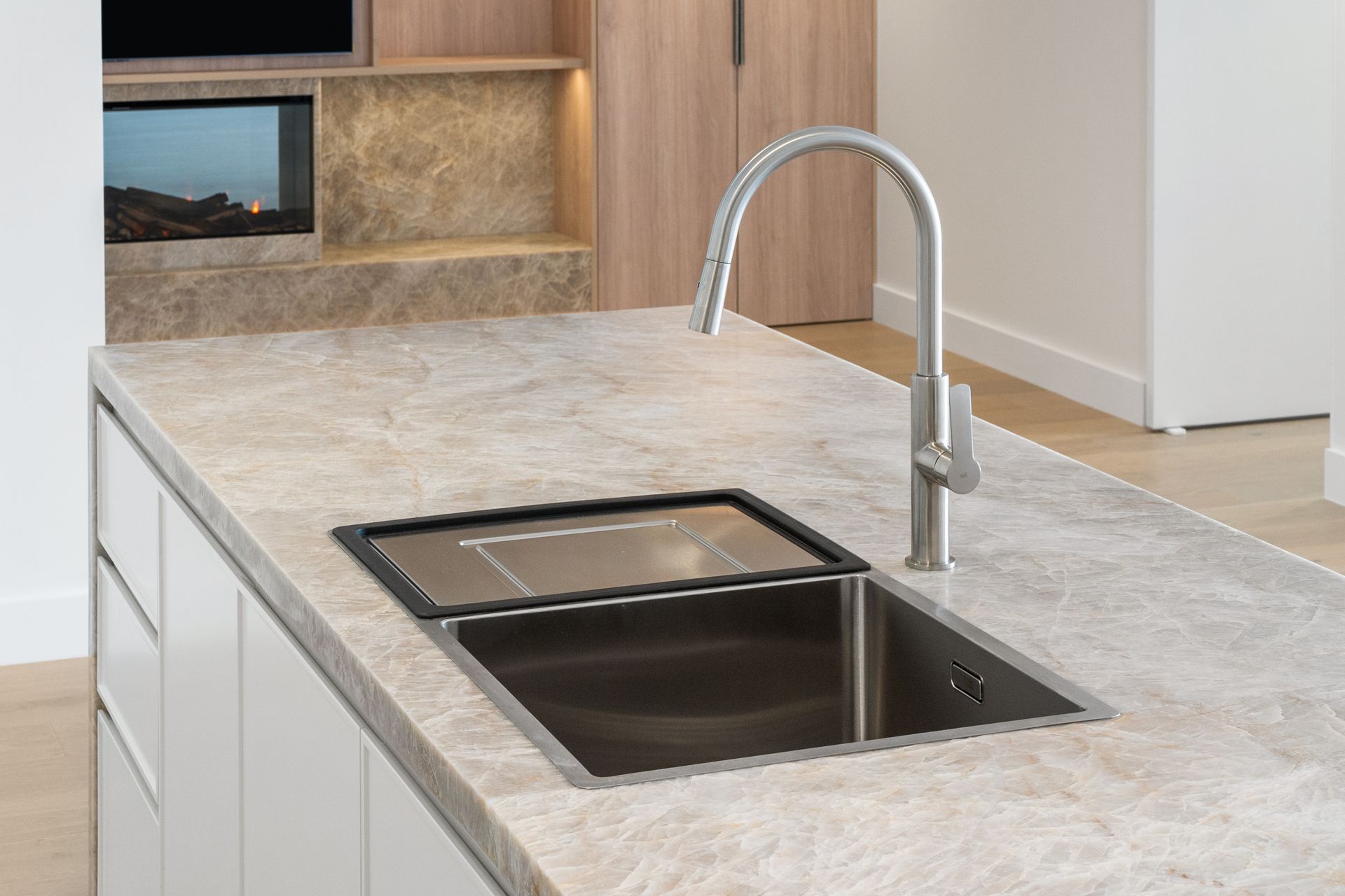 Stainless Steel Sink and Faucet on a Beige Countertop — ATH Projects in Rozelle, NSW