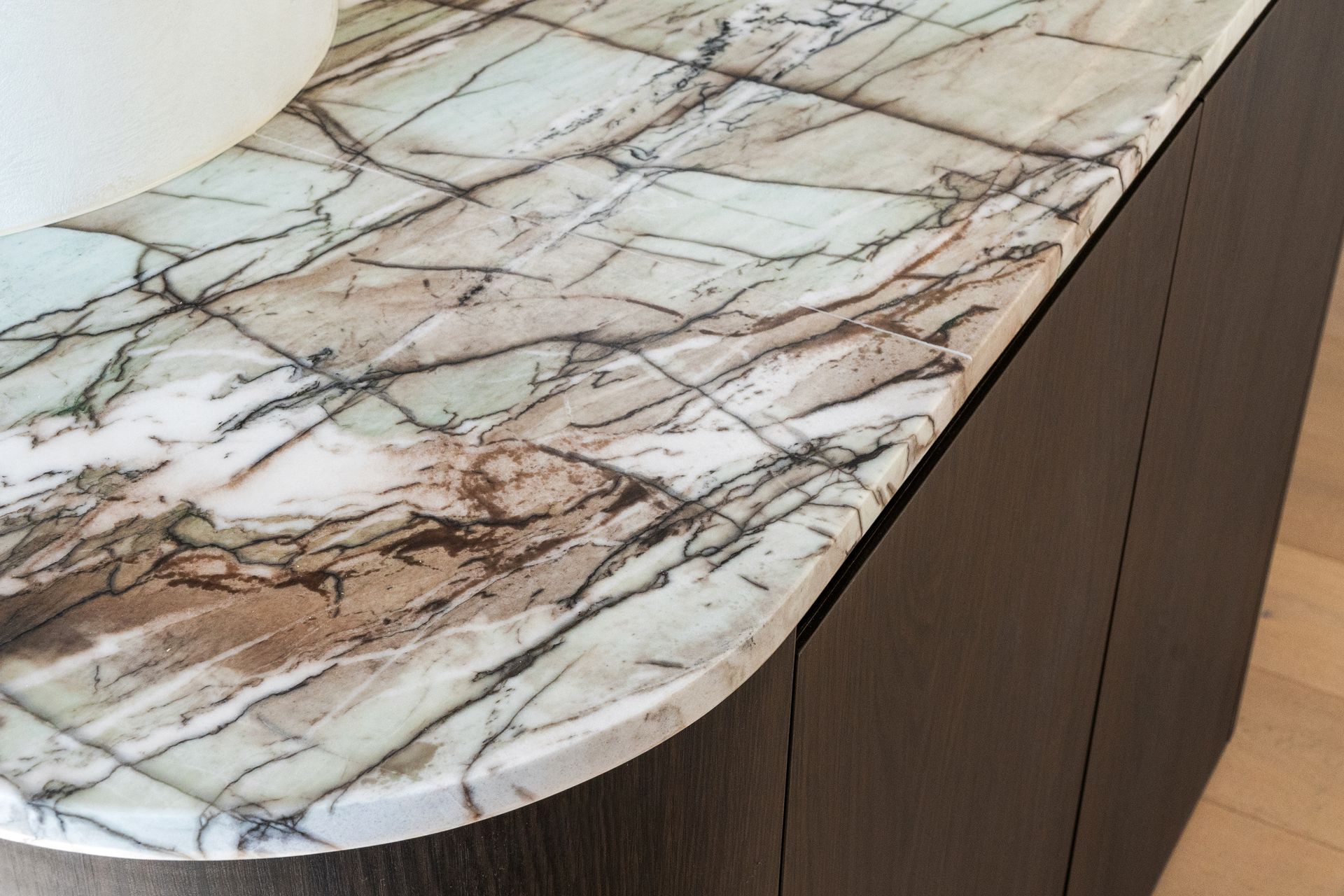 Close-up of a Rounded, Marble Countertop With Brown and Black Veining — ATH Projects in Cronulla, NSW