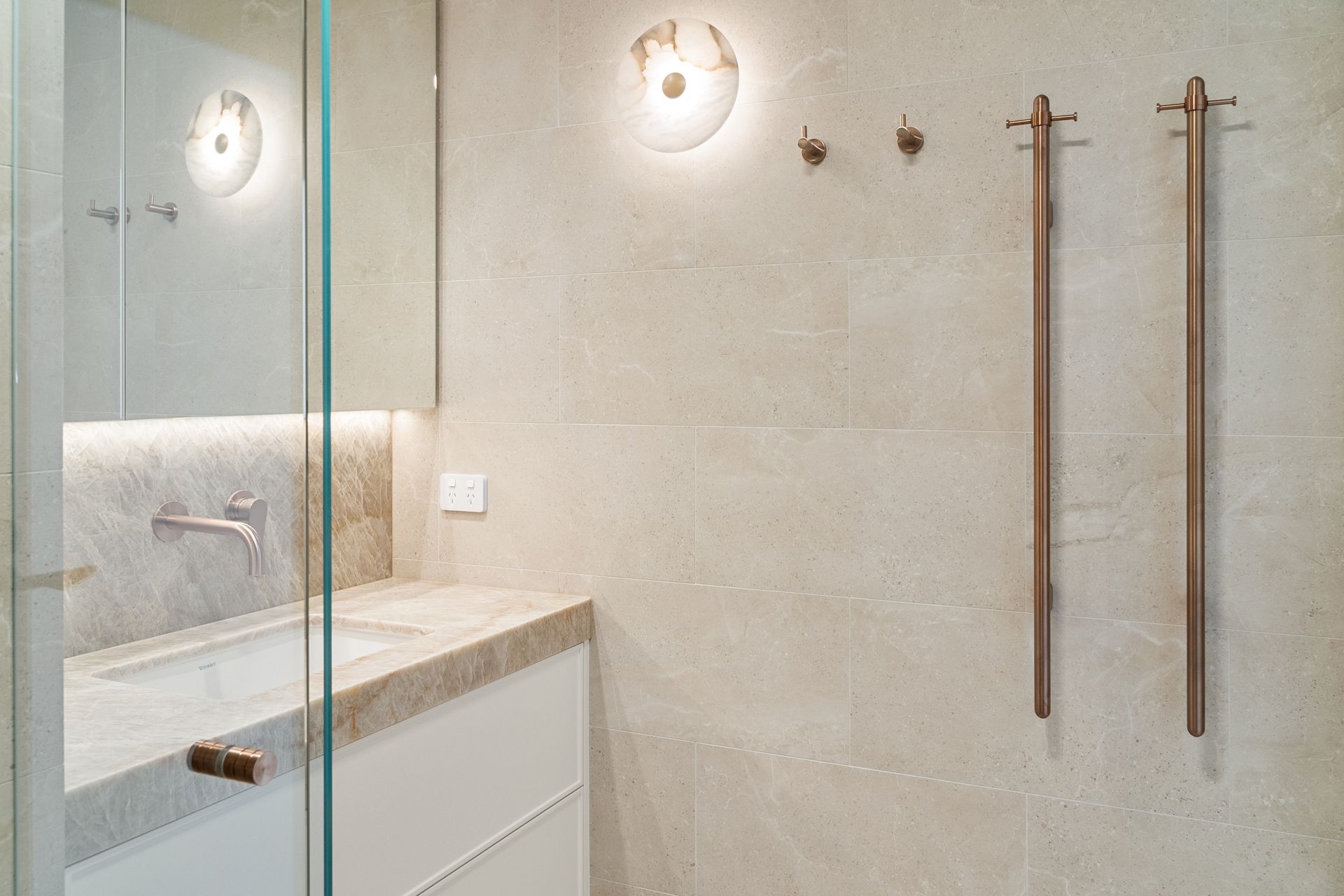 Bathroom With Tan Stone Wall — ATH Projects in Rozelle, NSW