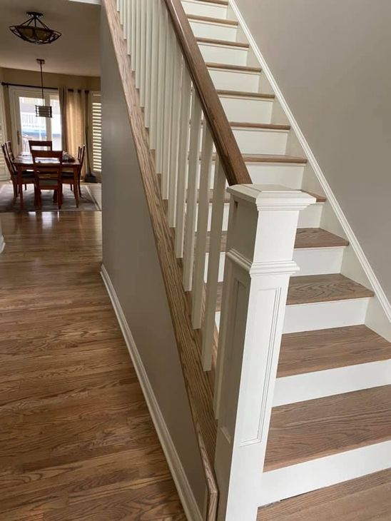 A & R Home Services remodel  staircase leading up to a dining room 