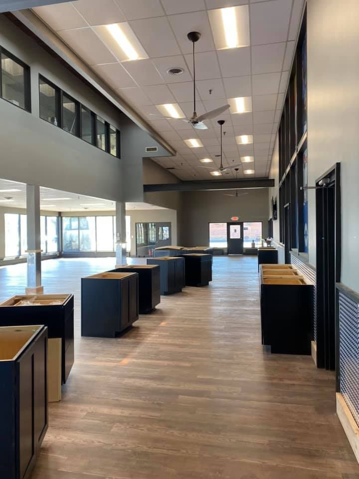 A long hallway with a lot of cabinets in it