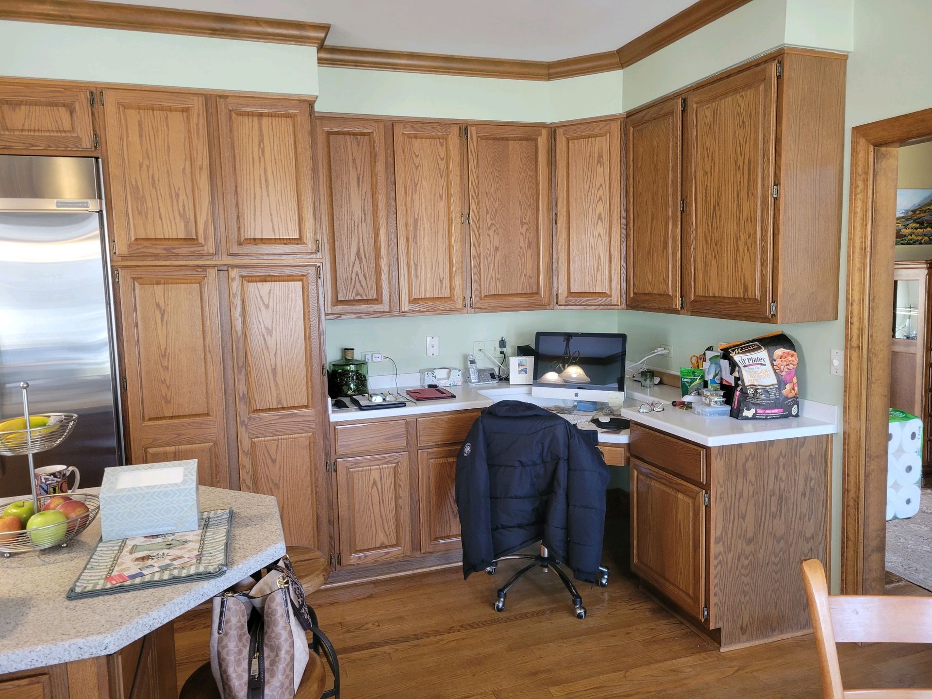 A & R Home Services remodel kitchen with wooden cabinets and stainless steel appliances