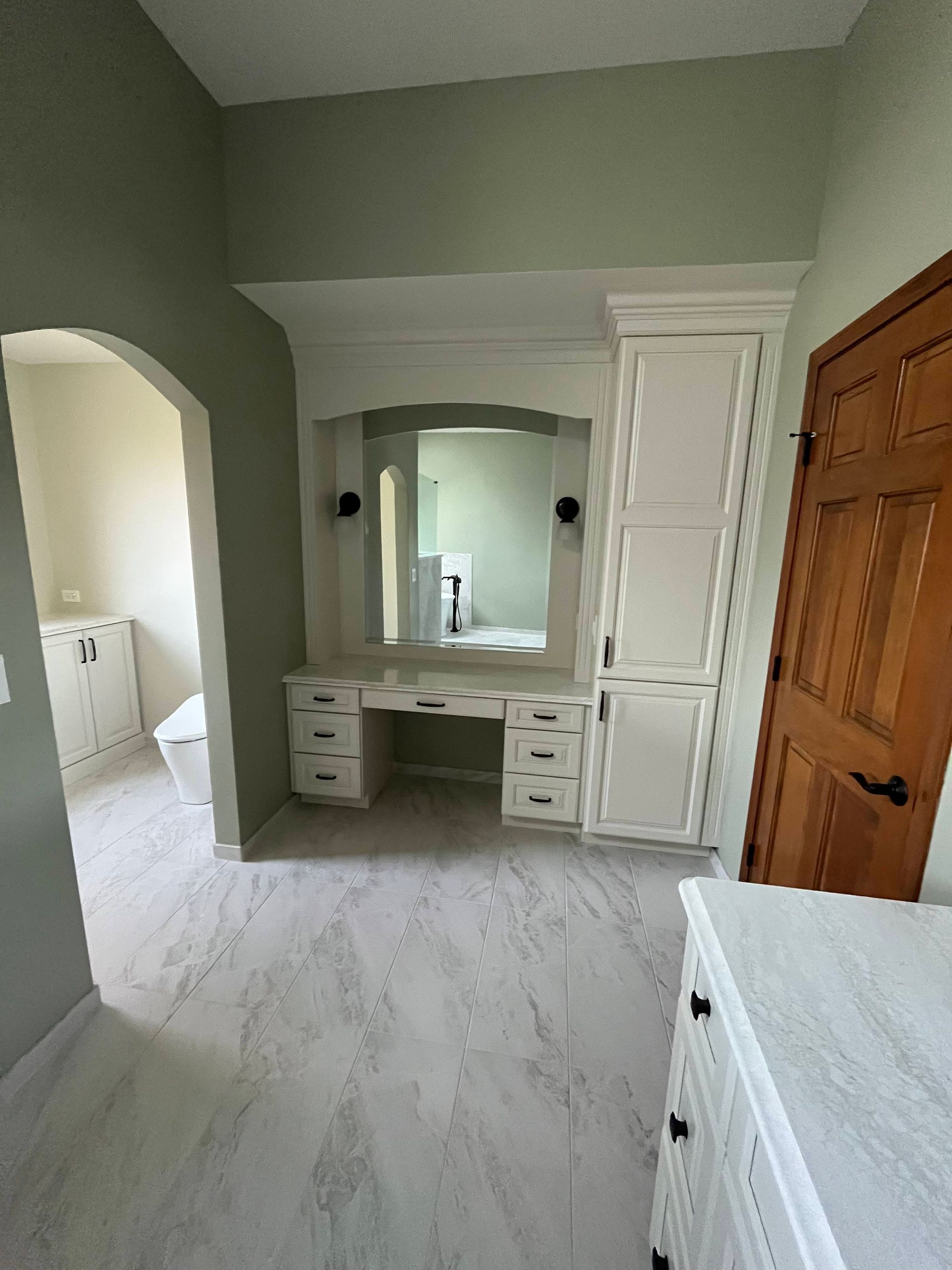 A & R Home Services remodel bathroom with a vanity and a mirror