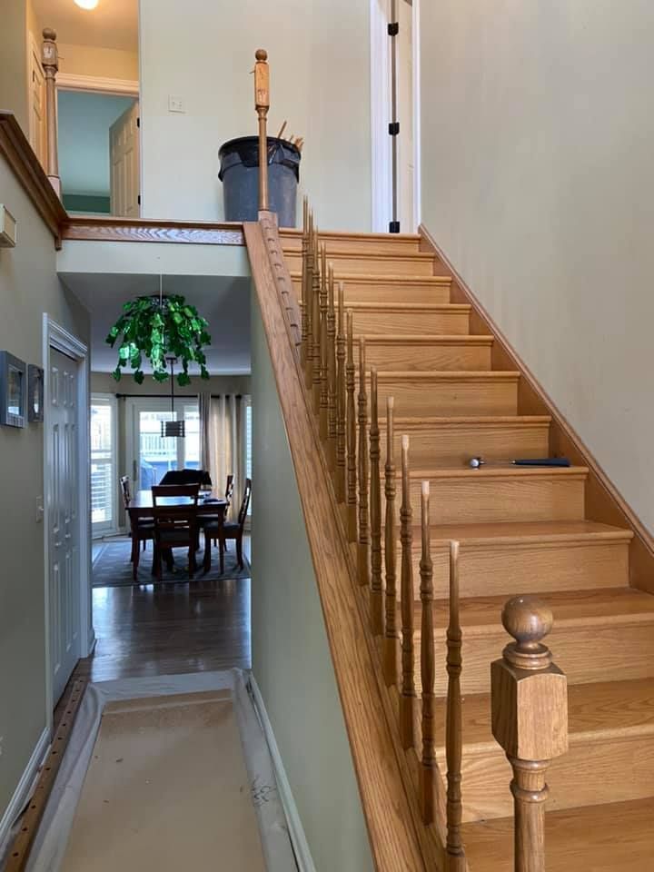 A & R Home Services remodel wooden staircase leading up to the second floor of a house