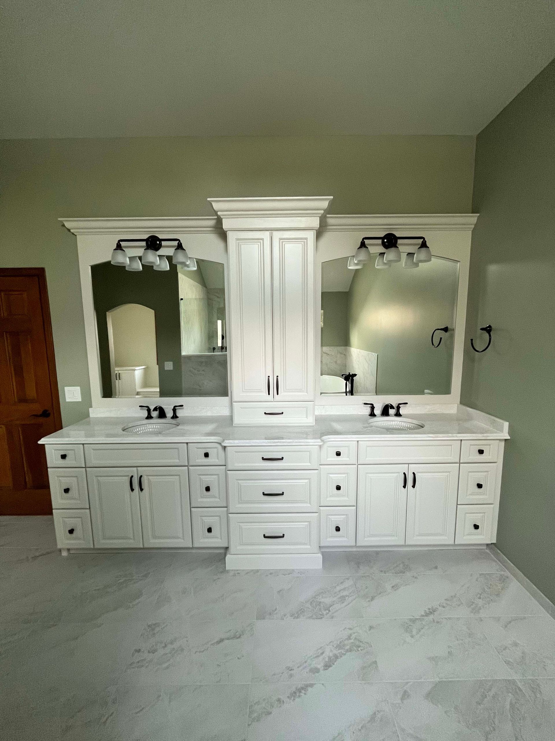 A & R Home Services remodel bathroom with two sinks and two mirrors