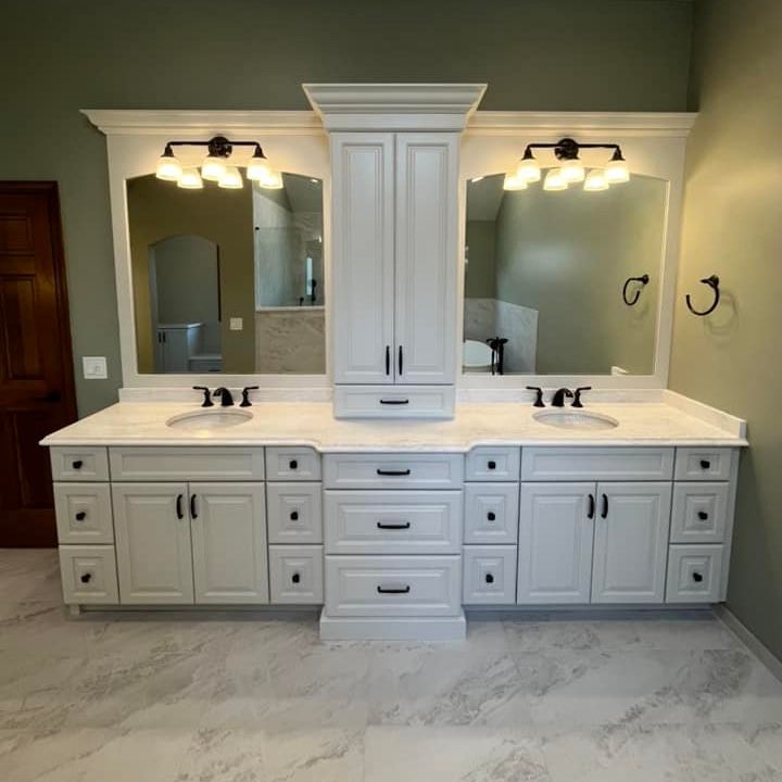 A & R Home Services remodel  bathroom with two sinks and two mirrors