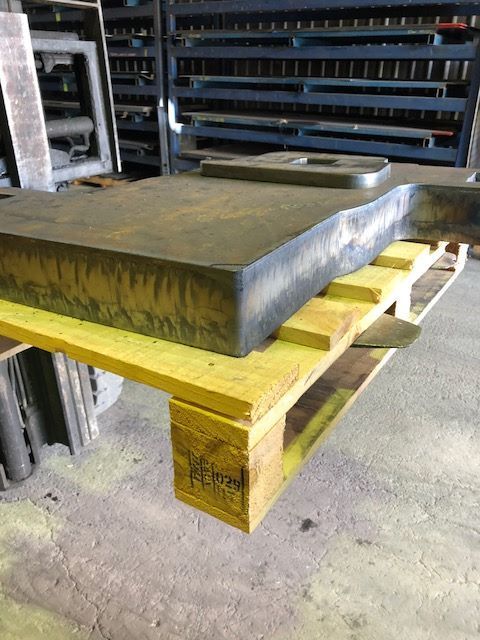 A Large Piece Of Metal Is Sitting On Top Of A Wooden Pallet – Wacol, QLD - Morgan Metal Corp