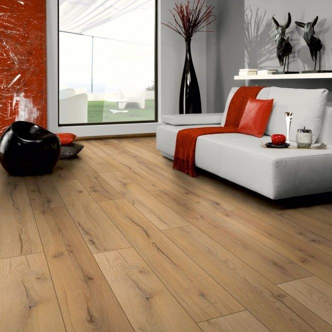 Century Oak Beige Laminate Flooring in a living room