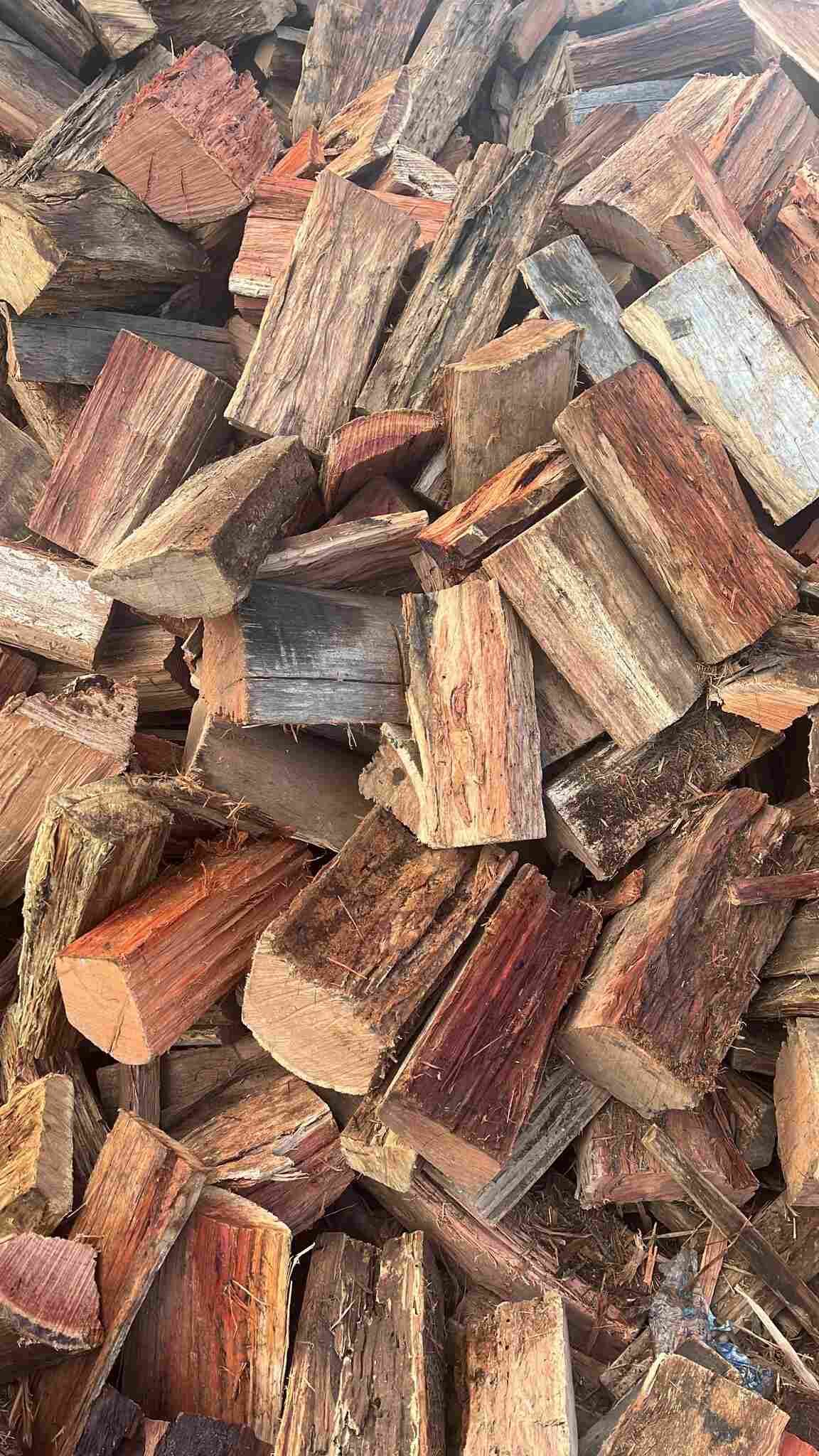 A Pile of Wood is Sitting on Top of Each Other — Manning Valley Landscapes in Wingham, NSW