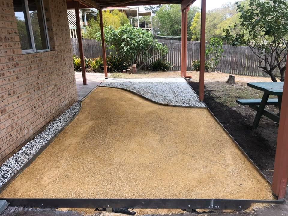 Patio With Tan-coloured Surface and Gravel Border — Manning Valley Landscapes in Hallidays Point, NSW 