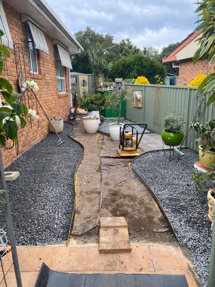 Backyard With a Gravel Path Under Construction — Manning Valley Landscapes in Old Bar, NSW