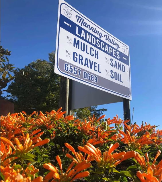 A sign that says manning valley landscapes mulch gravel sand and soil — Manning Valley Landscapes in Coolongolook, NSW