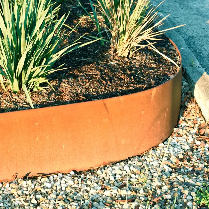 Rust-coloured Metal Edging Frames a Garden Bed — Manning Valley Landscapes in Taree, NSW
