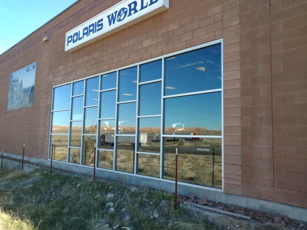 A building with a sign that says polaris world on it