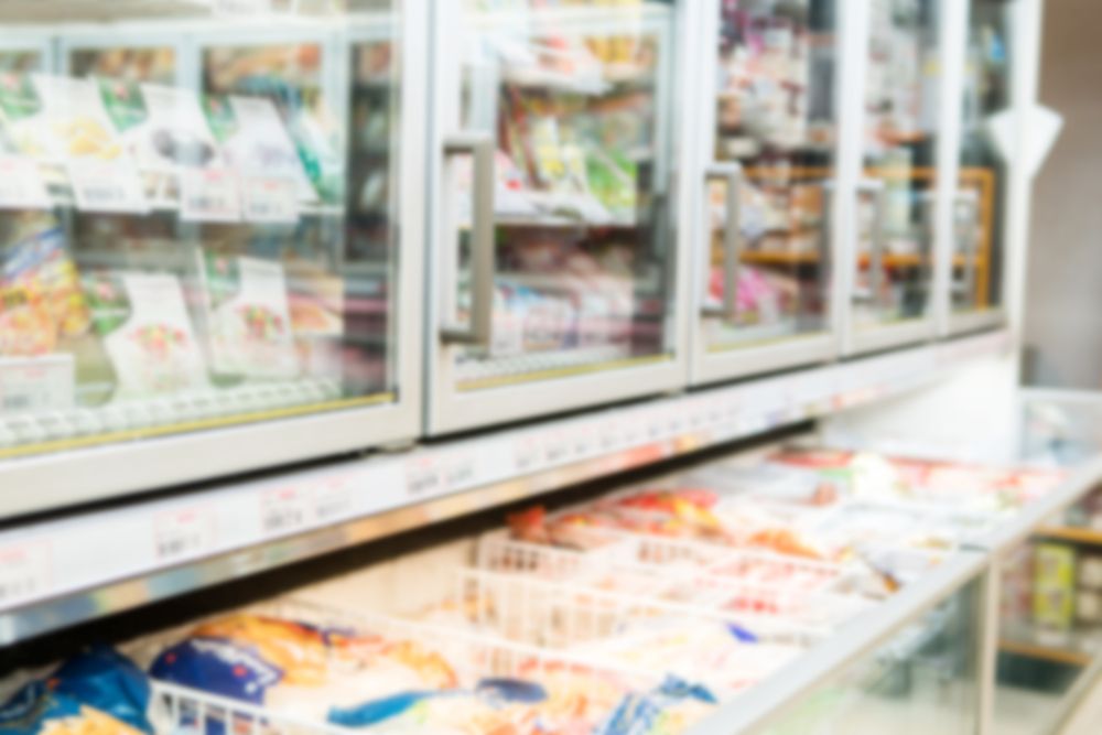 A Blurred Image of a Frozen Food Section of a Grocery Store — Hutchy's Refrigeration & Electrical in Torres Strait, QLD