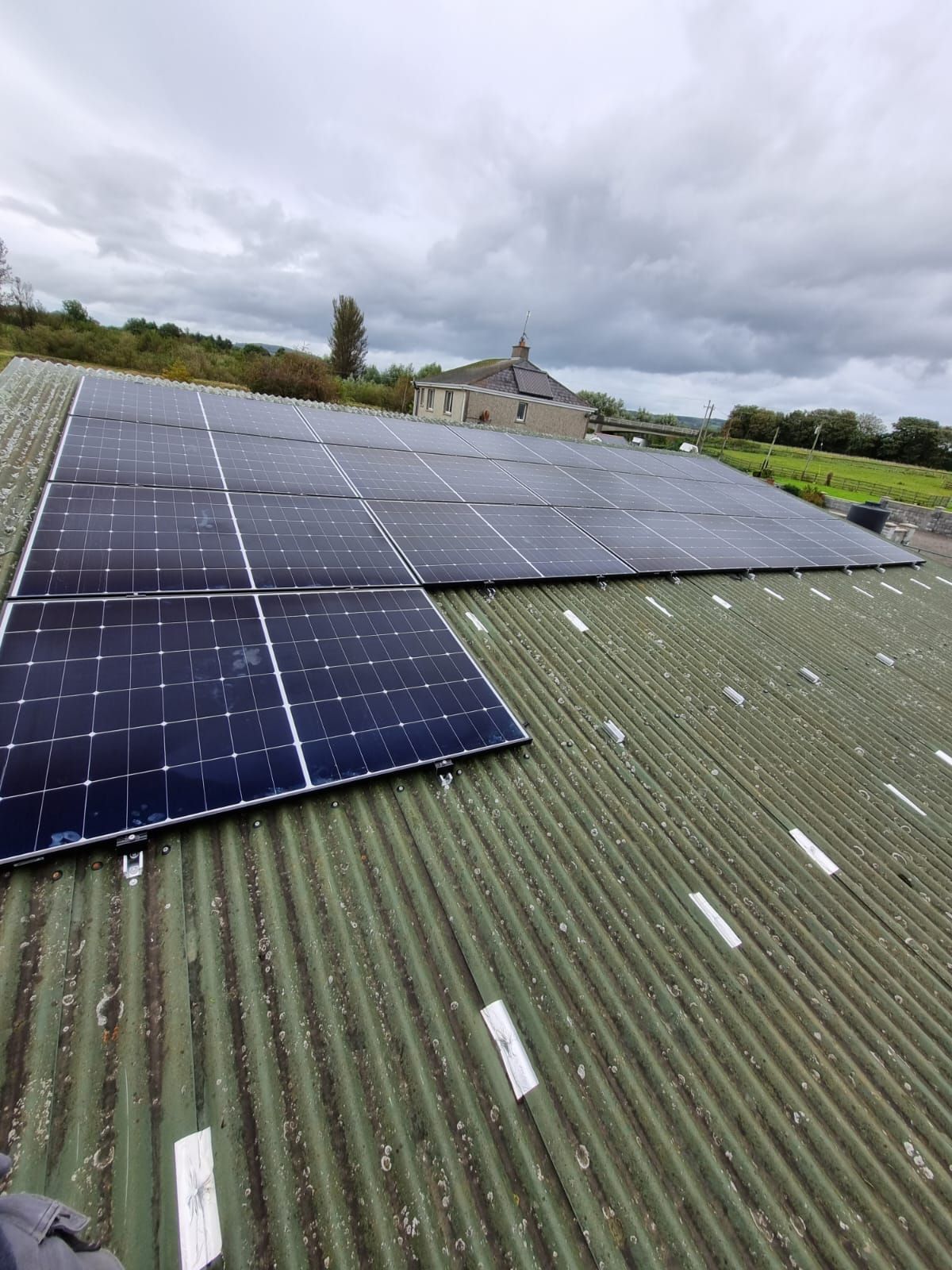 A roof with a lot of solar panels on it