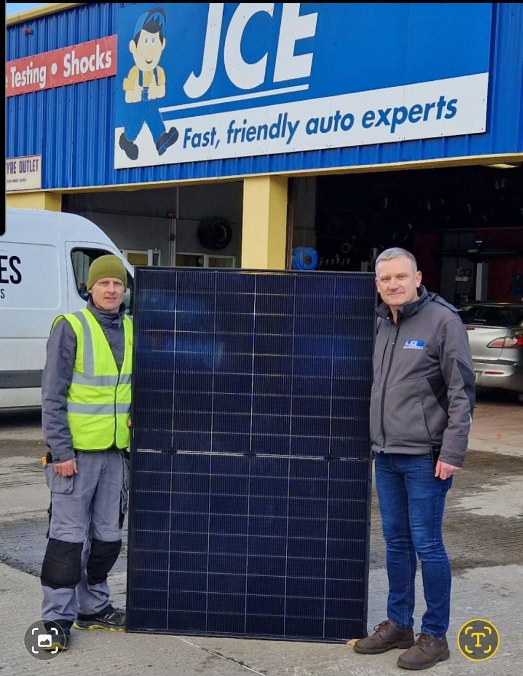 Two men standing in front of a building that says jce fast friendly auto experts