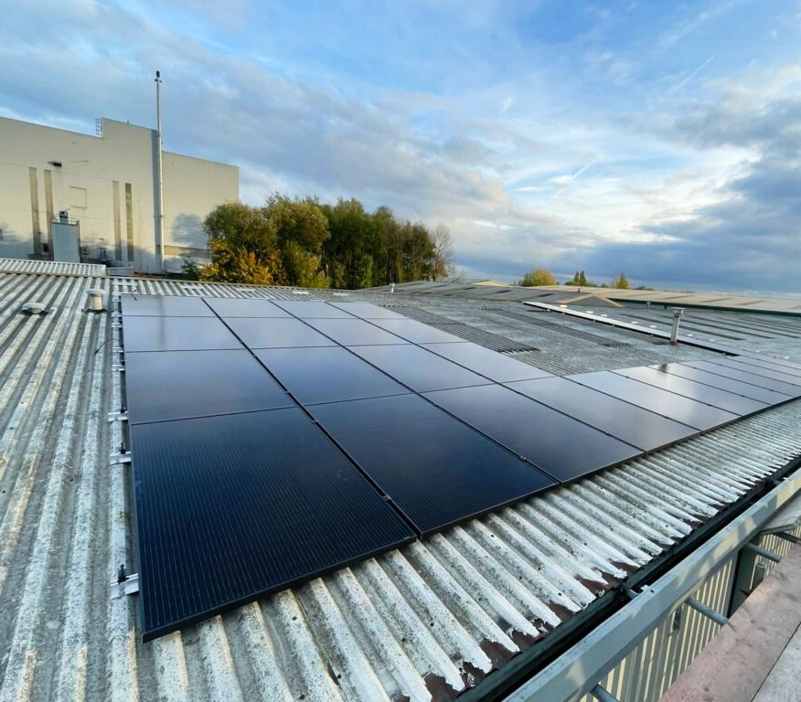 A roof with a lot of solar panels on it