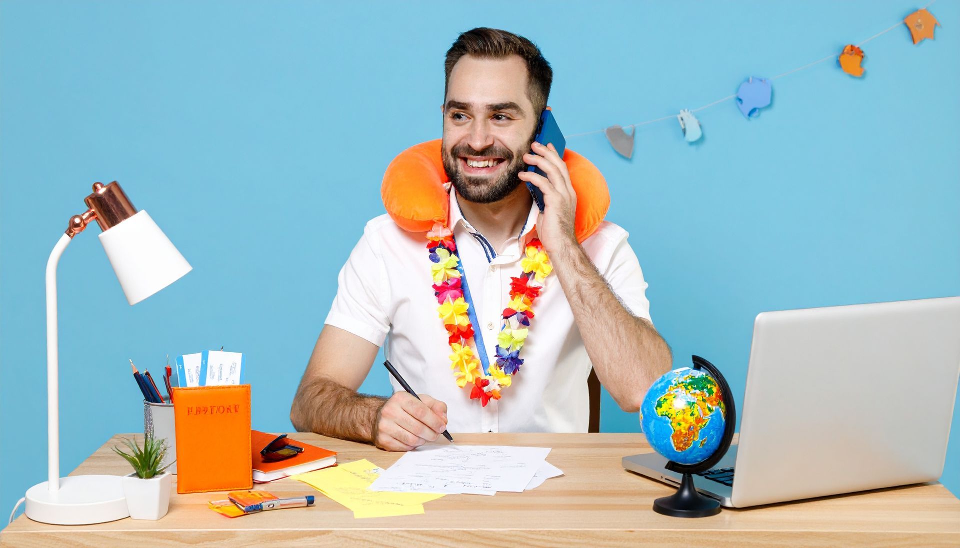 Travel consultant happily receiving a referral call from a client in a modern office setting, conveying the power of word of mouth travel sales.