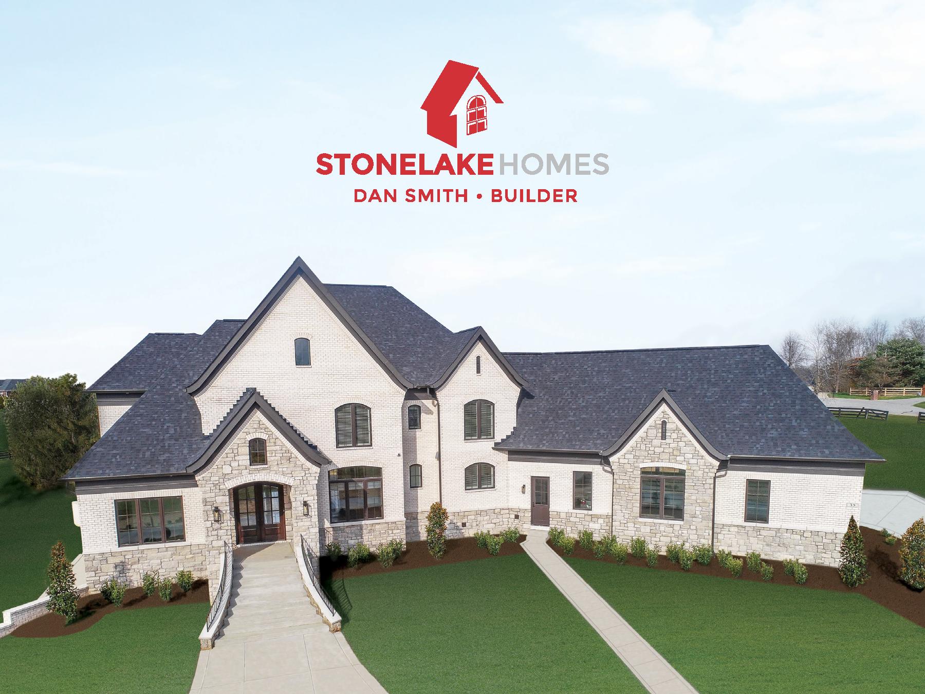 A large house with the words stonelakehomes can smith builder on it