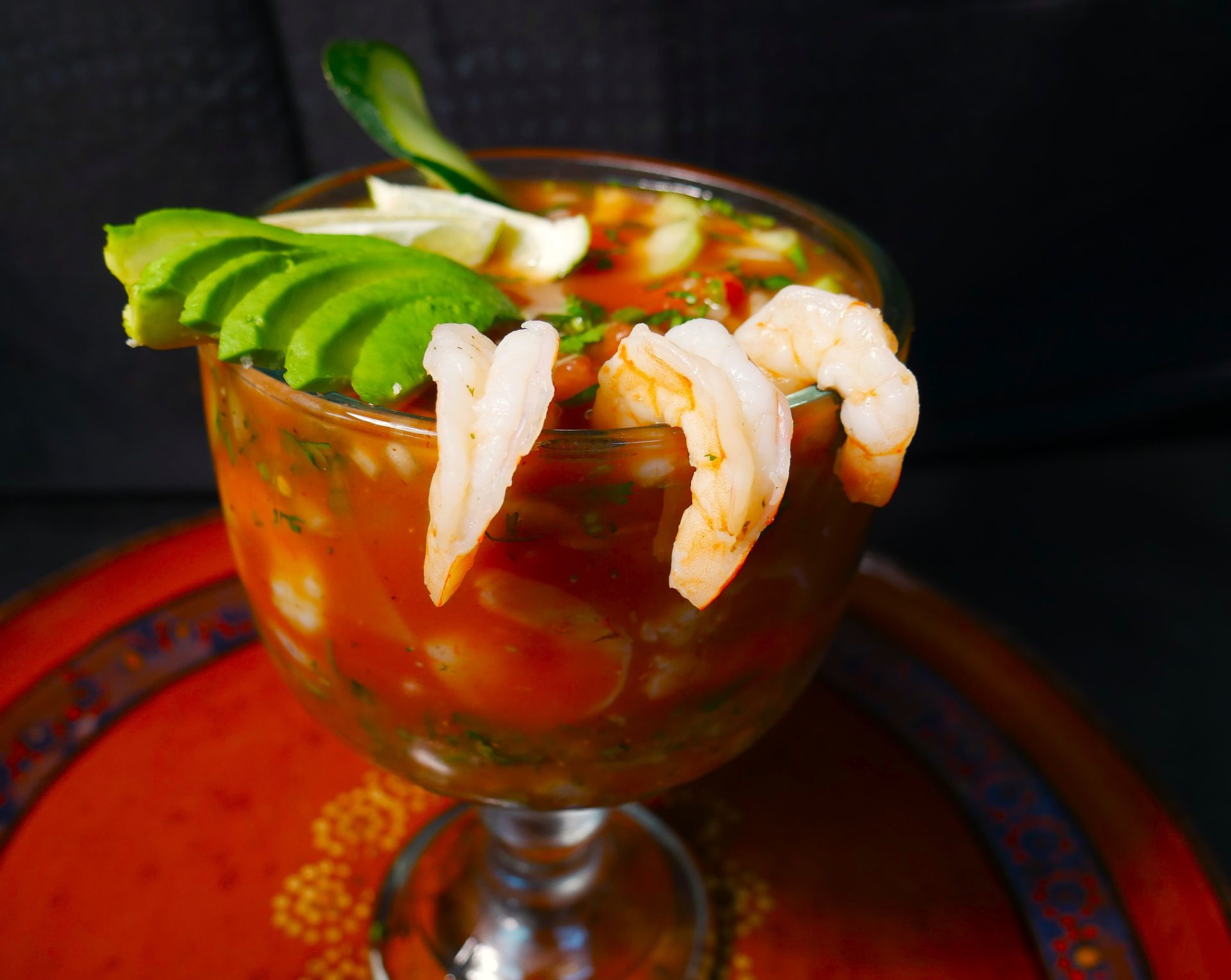 Fresh jumbo shrimp garnishing our signature Mexican cocktail, showcasing premium seafood quality at Taqueria El Chaparrito