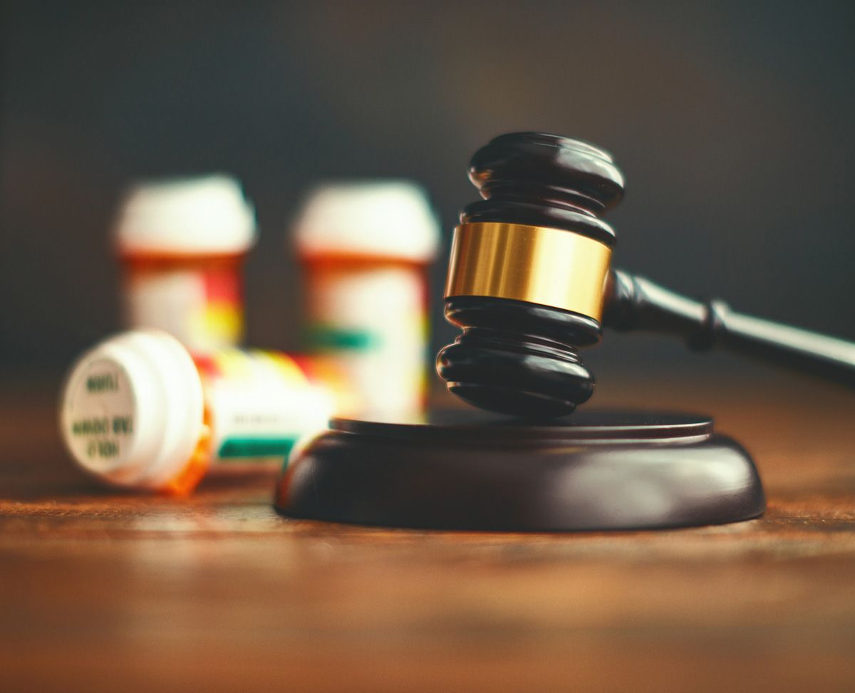 Gavel with Medications — Yuba City, CA — Law Office of Geoffrey J. Heitman