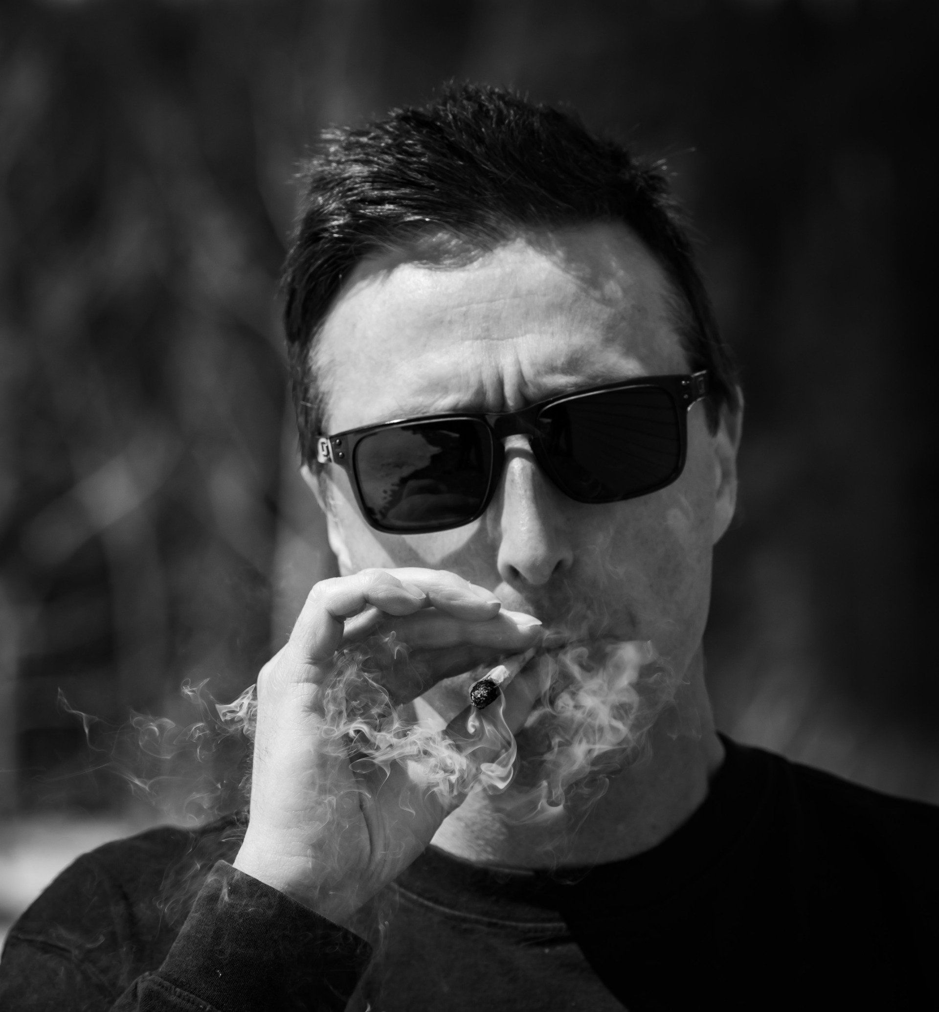 Matt Quam poses with his tie-dyed baby