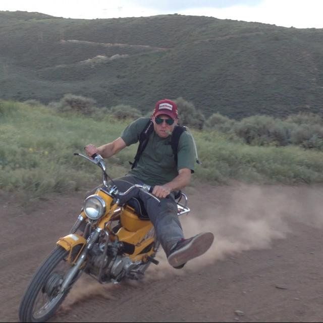 Dan Rolfe from the USA rides a dirt bike in the Colorado Rockies.