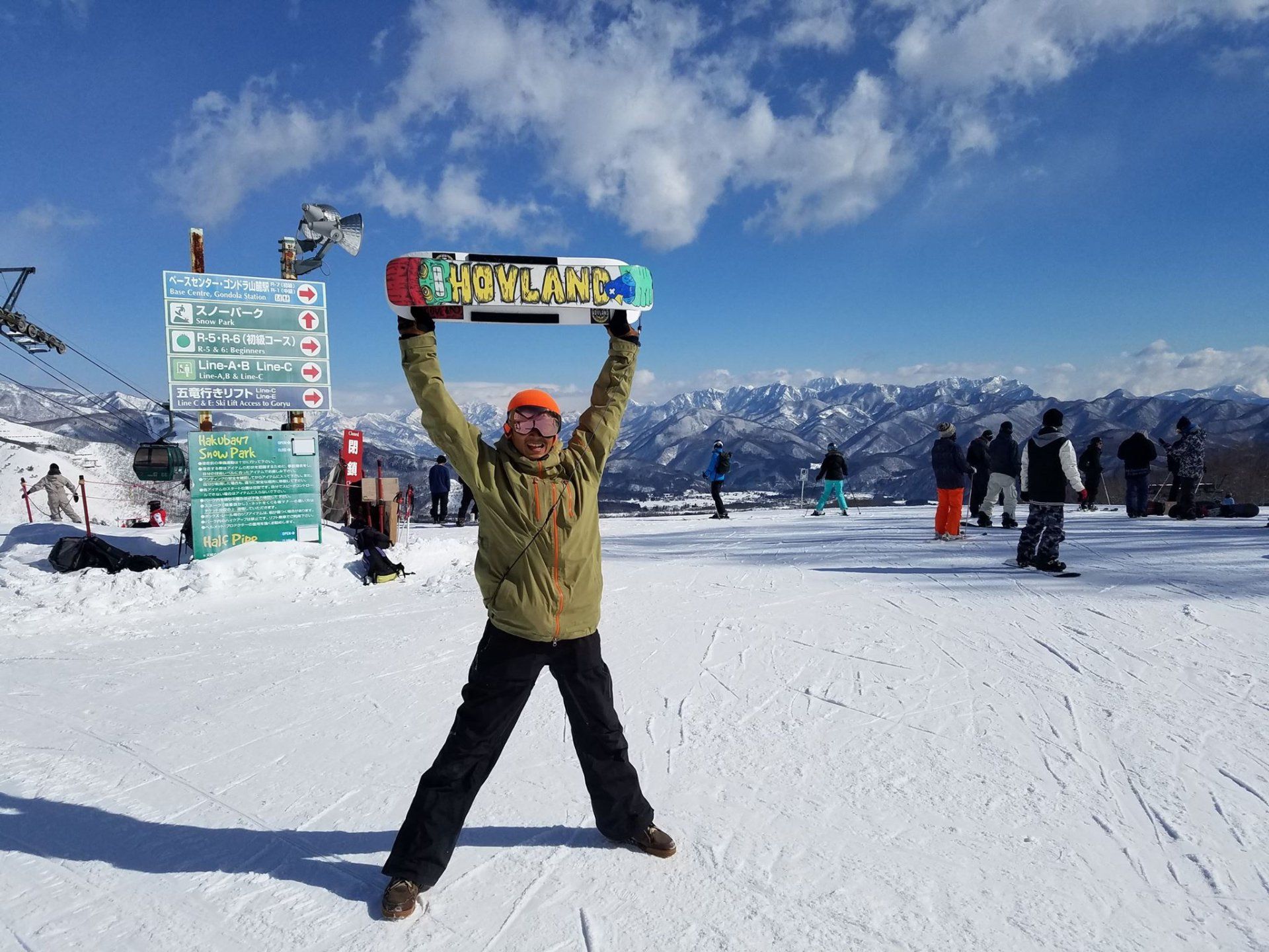 ET from Japan preparing to ride his Hovland Five-Oh Snowskate.