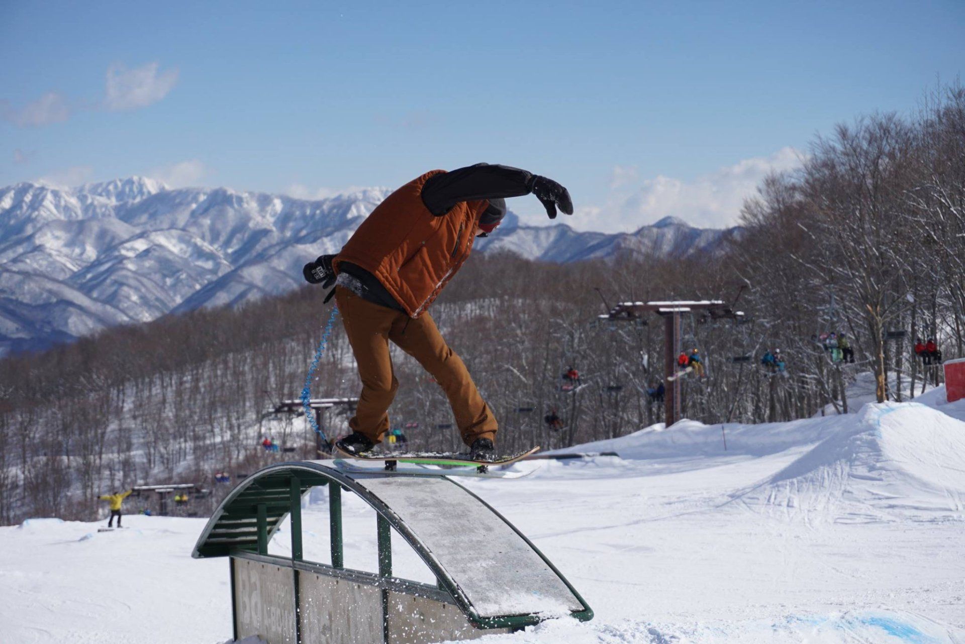 Kouta Asaumi from Japan performs a boardslide on a rainbow box.