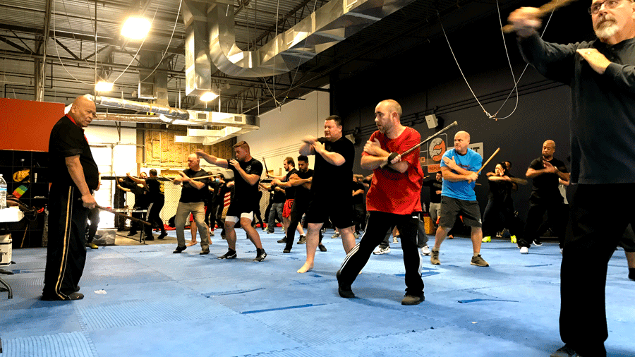 Grandmaster BobbyTaboada watches students during Balintawak Eskrima Cuentada System seminar