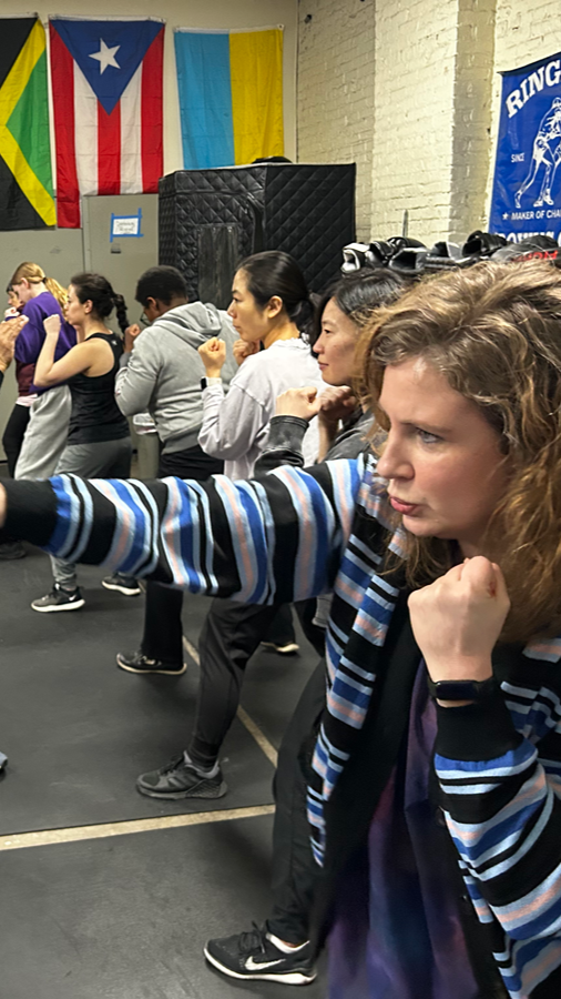 A woman clenching her purse in one hand while holding down the arm of an attacking man. This is an ai-generated image.