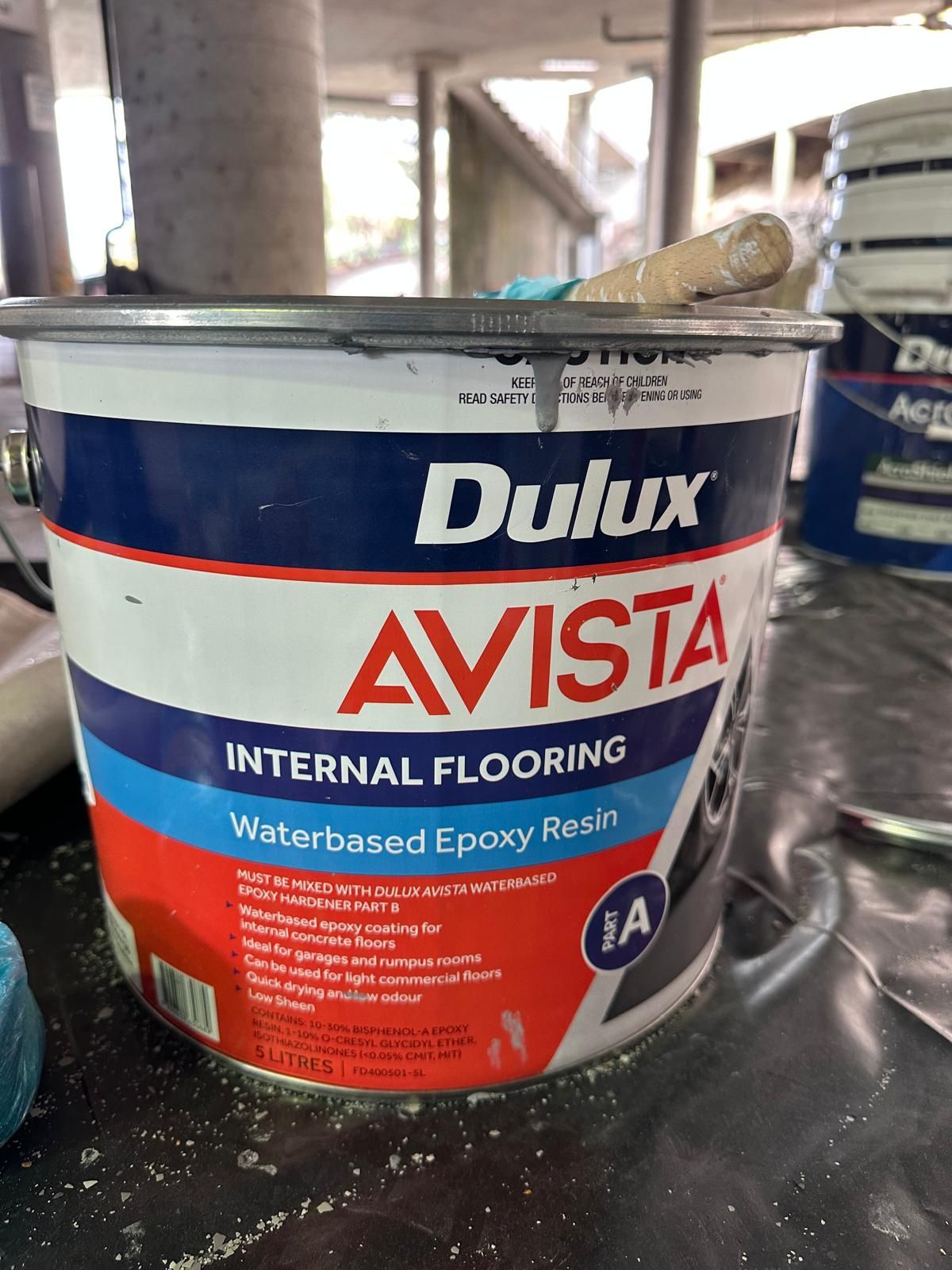 A bucket of dulux avista internal flooring waterbased epoxy resin