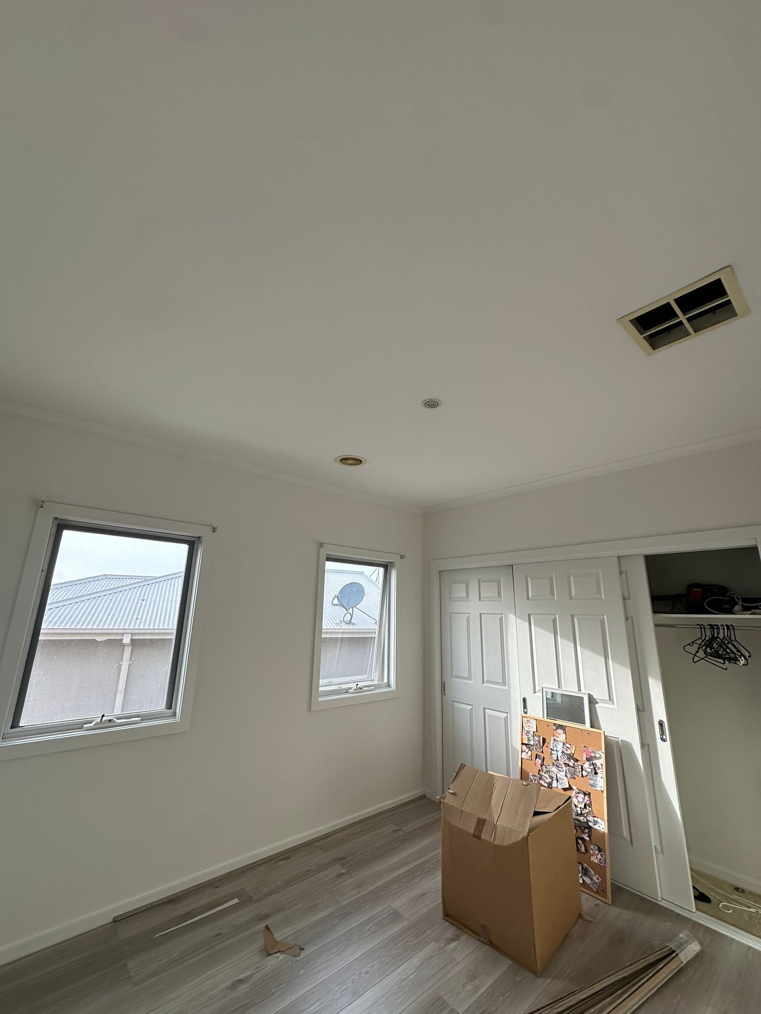 There is a cardboard box in the middle of the room.