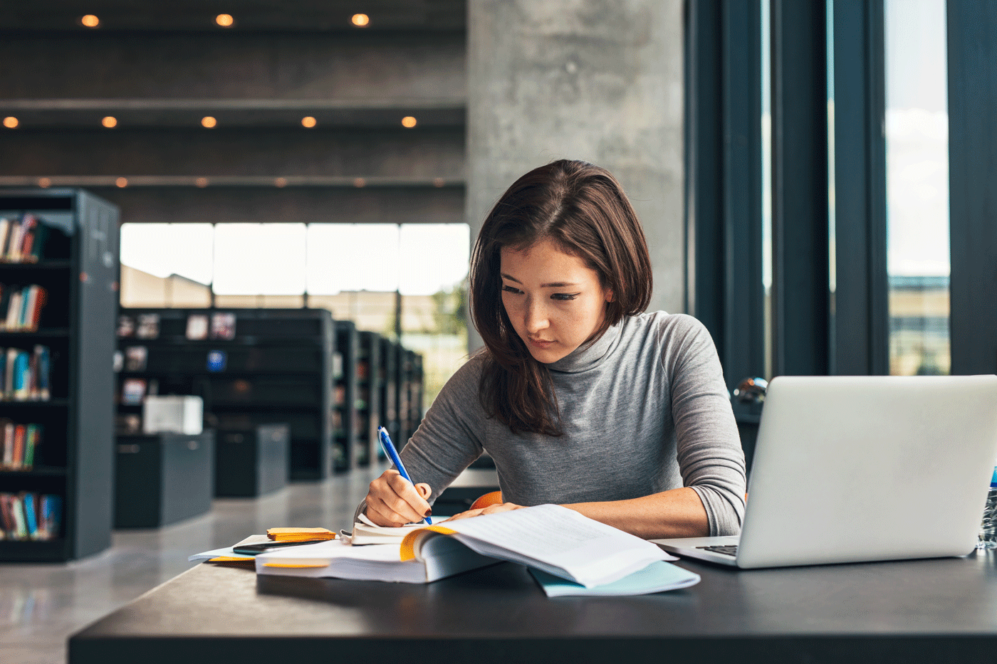 girl studying at library