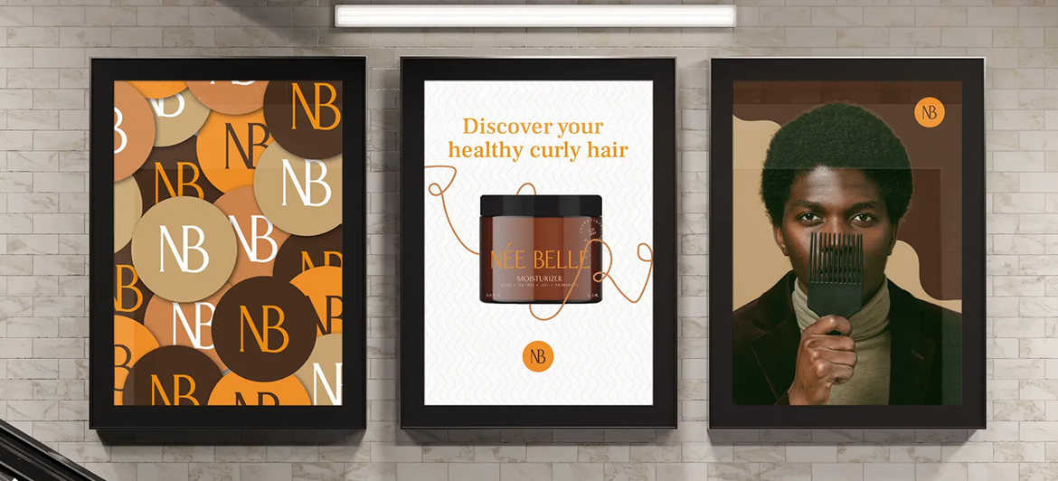 Three posters on a brick wall: one with the 