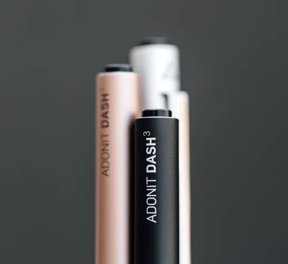 A black stylus labeled 