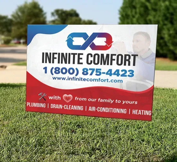 A yard sign for Infinite Comfort featuring its logo, contact info, and services: plumbing, drain-cleaning, AC, and heating.