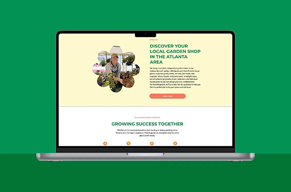 Laptop screen displaying a garden shop website for the Atlanta area against a green background.