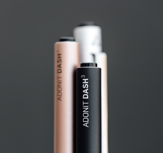 A black stylus labeled 